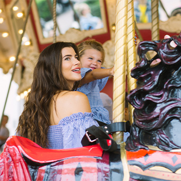 Toddler and mother on the Carousel